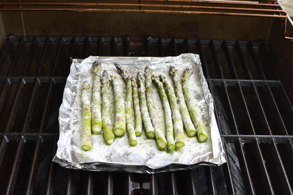 Asparagus on foil on a grill