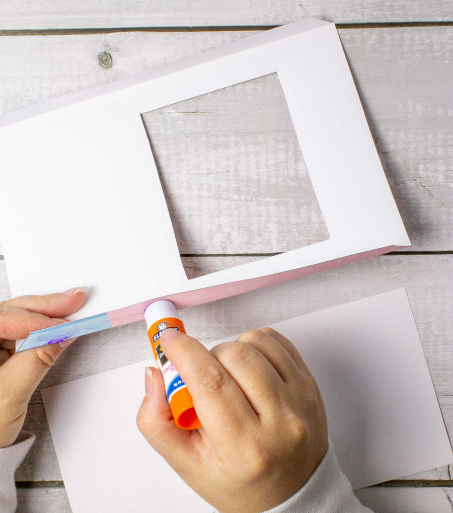 Adding glue to the tabs of the ice cream shop