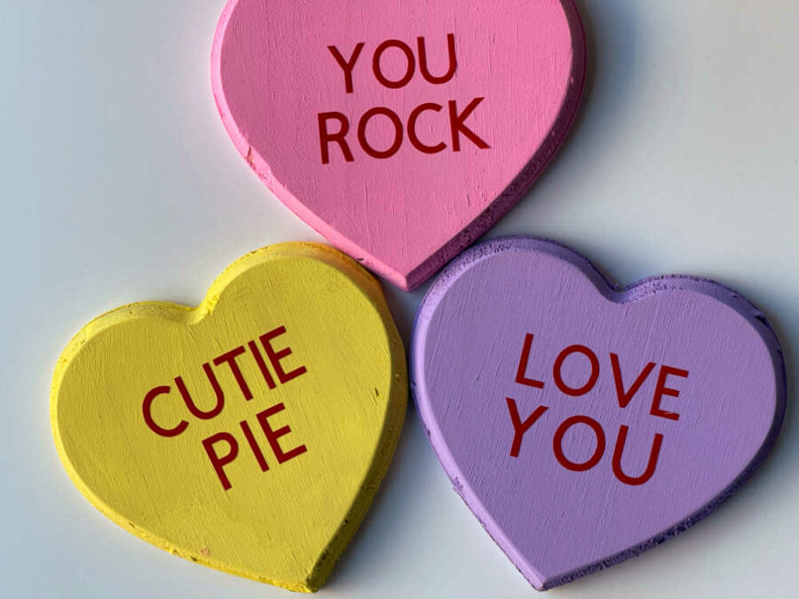 Yellow, pink and purple hearts with sayings on them
