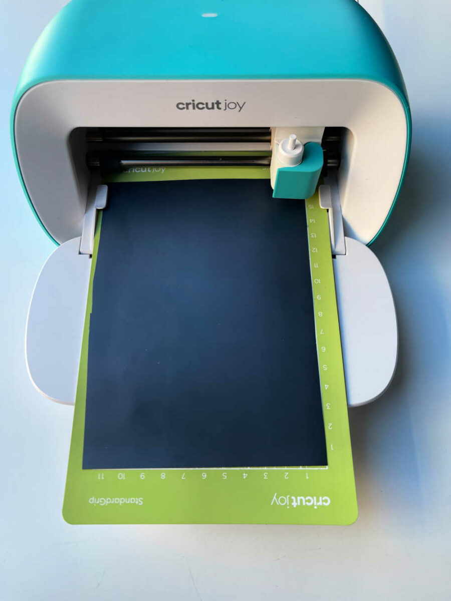 Cricut Joy with black HTV iron-on vinyl