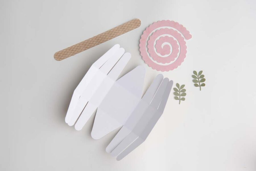 Paper basket, handle, pink flower, green leaves