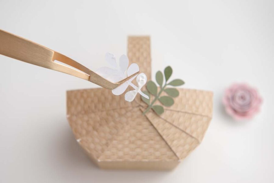 Green paper leaves glue tweezers paper basket