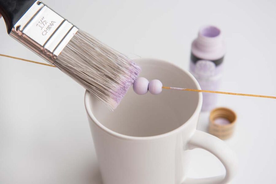 Painting beads purple