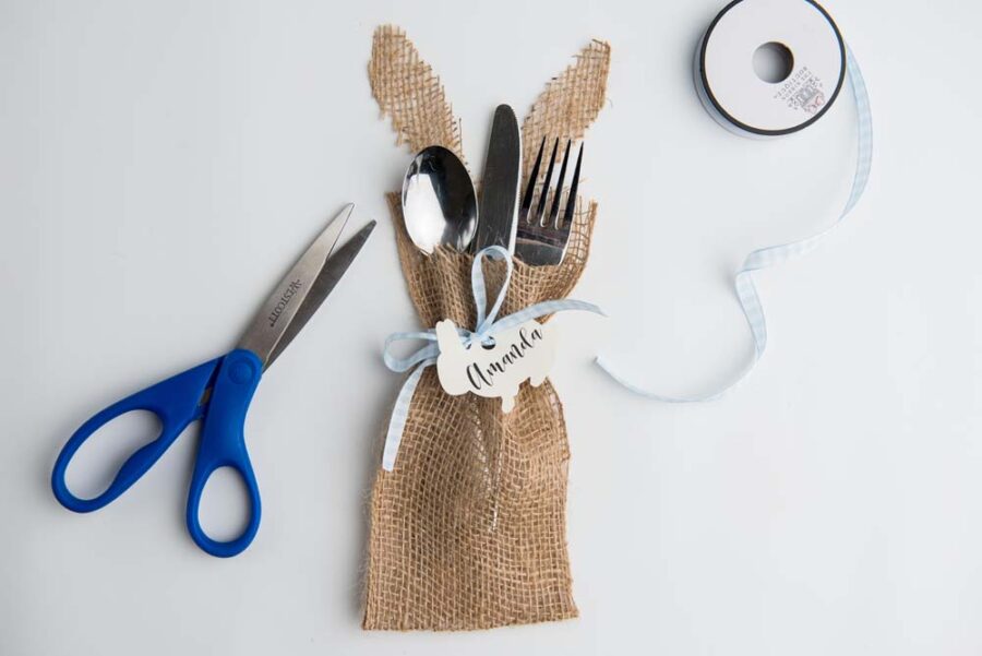 Scissors, ribbon spool with finished Easter silverware holder
