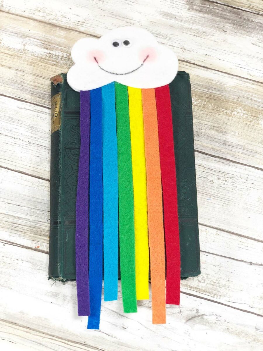 Rainbow bookmark on top of a book