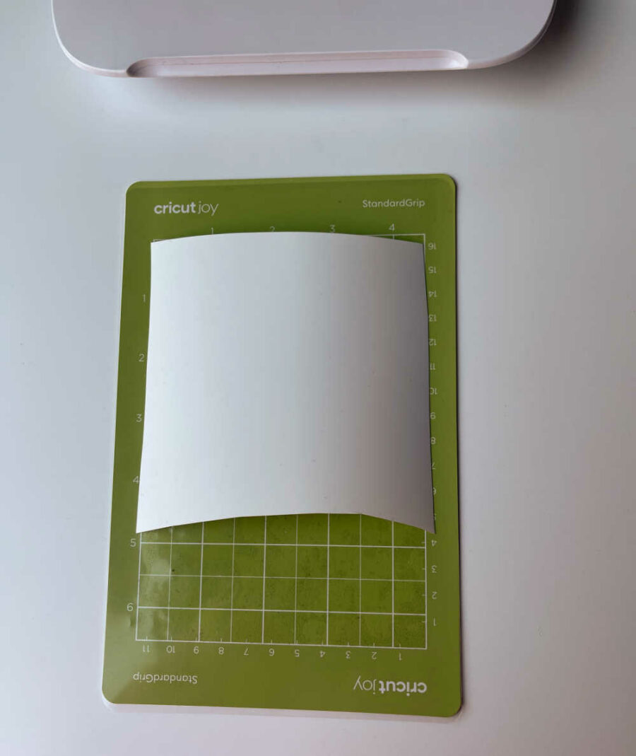 White HTV on Cricut Joy Standard Grip mat