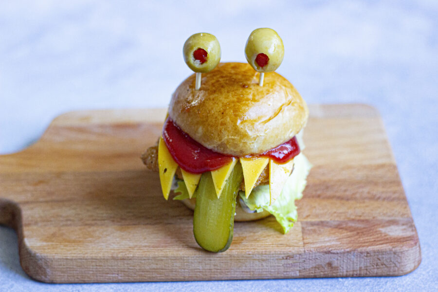 complete Monster burger on a cutting board