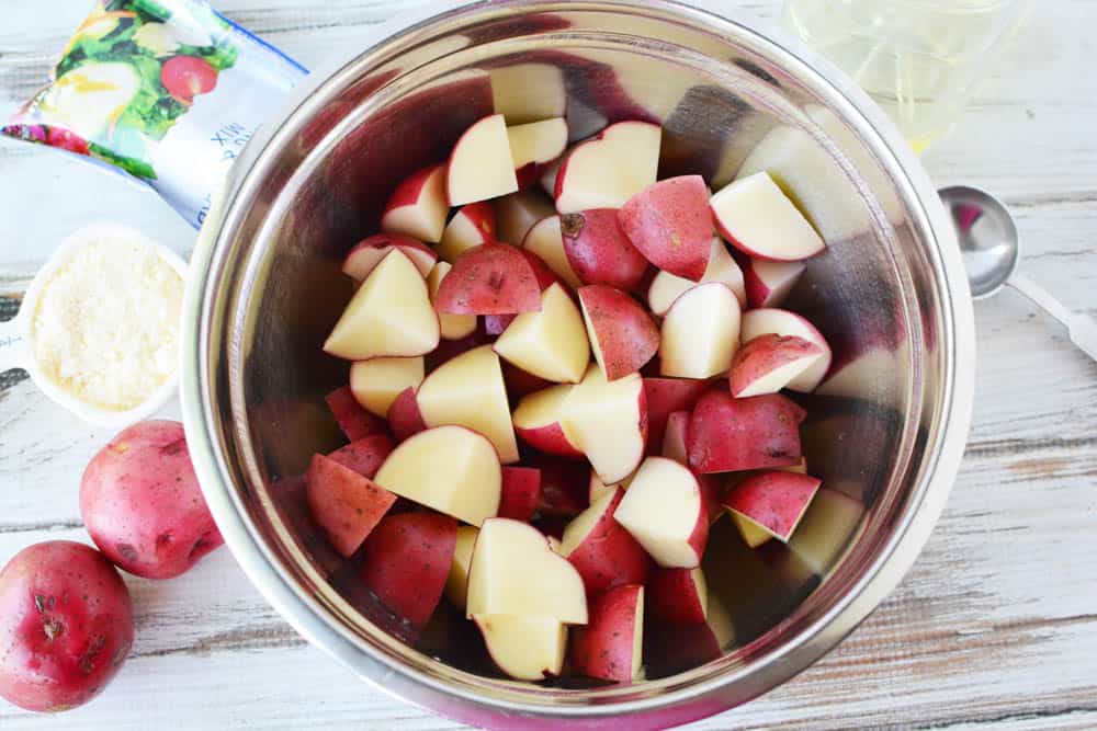 Mixing bowl full of red potatoes