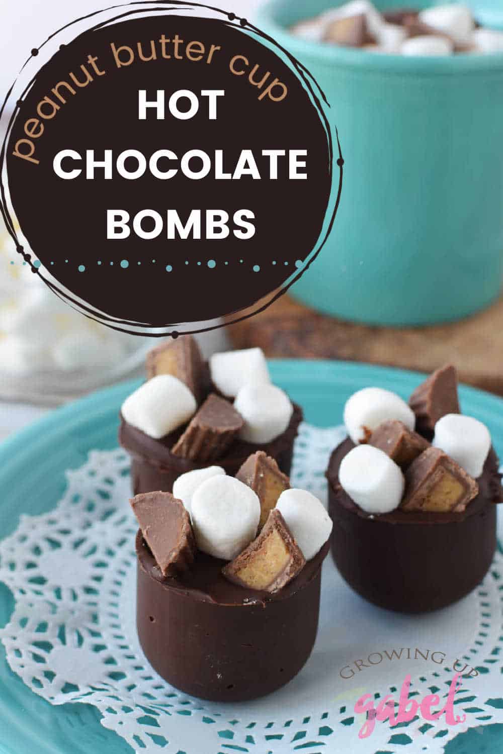Peanut butter cup hot chocolate bombs are a chocolate shell topped with candy peanut butter cups and filled with peanut butter that melts into a deliciously rich mug of peanut butter and chocolate hot cocoa.
