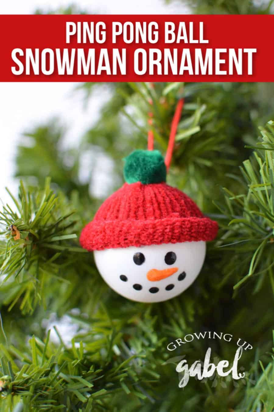 Make a DIY snowman craft ornament using fuzzy gloves and ping pong balls plus a few basic craft supplies.