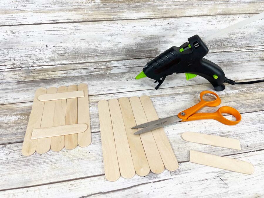 Craft sticks with a glue gun and scissors