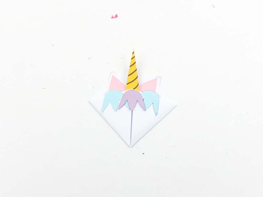 Unicorn bookmark with ears, horn and mane glued on
