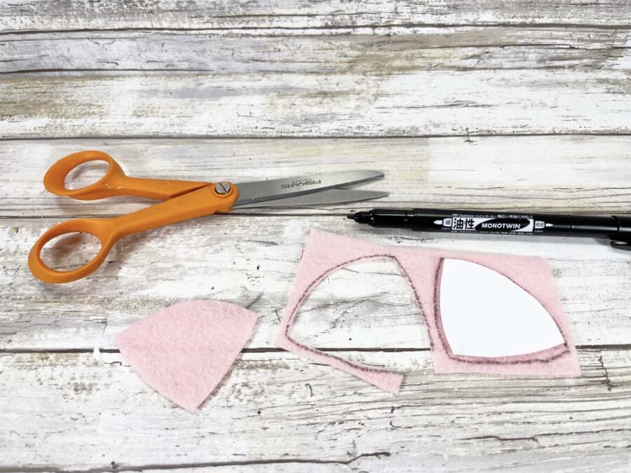 Pink felt cut into a bunny nose with scissors and a marker