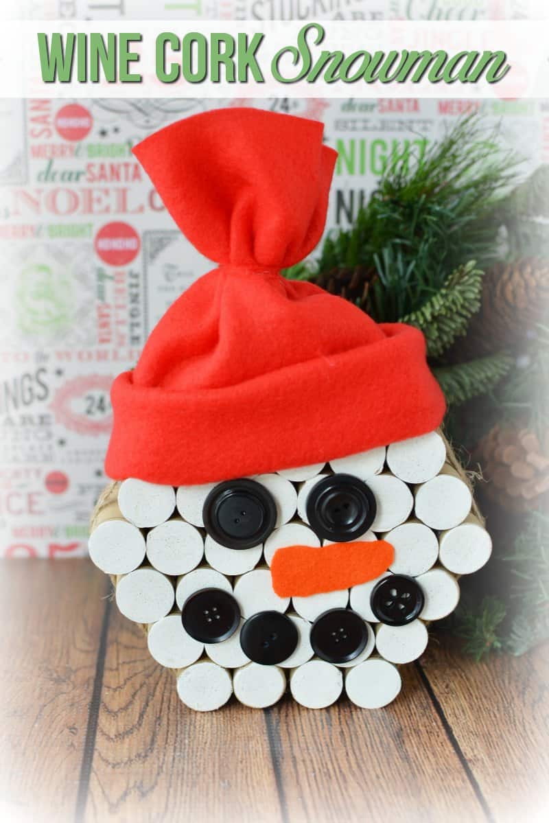 CLICK HERE for this easy DIY Snowman Wine Cork Christmas Craft tutorial! #ChristmasCrafts #SnowmanCrafts #WineCorks