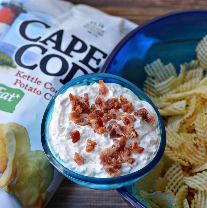 Need a delicious pot luck recipe? Look no further than this homemade potato chip dip. Made with sour cream, caramelized onions and bacon, you'll always bring home an empty dish. 